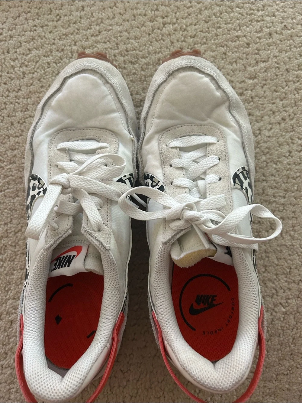 Nike Women’s White Sneakers with Coral Accents